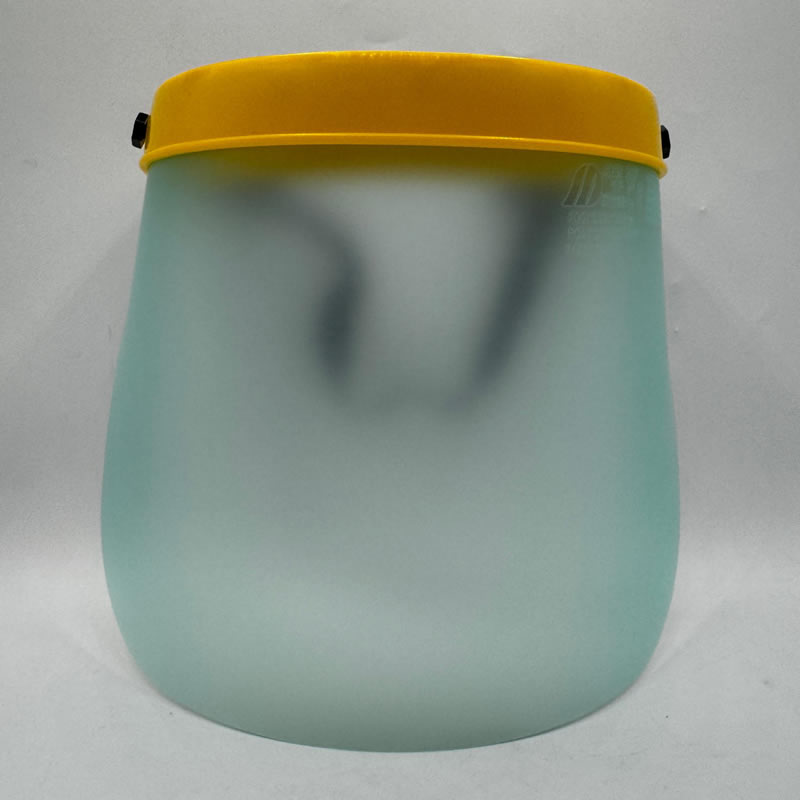 Brush cutter protective visor with yellow band. Safety equipment.